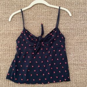 John Gault black “tank” top with red flowers . Has adjustable straps